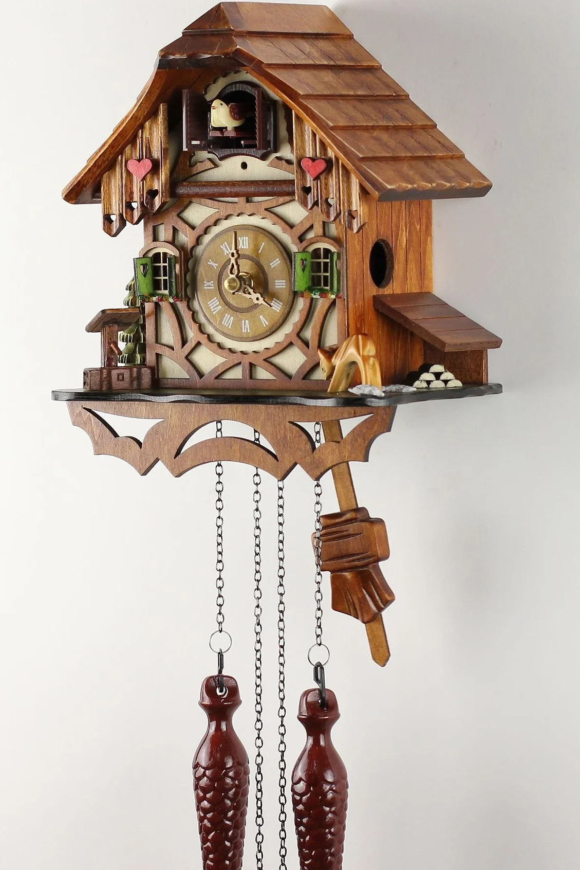 Orologio a cucù al quarzo, in vero legno, funzionamento a batteria, con carillon musicale, a forma di casetta, 24 cm