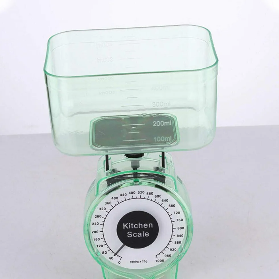 Vogueing - Bilancia meccanica da cucina, 1 kg di capacità, per cottura e cottura (colore casuale)
