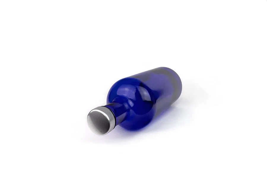 Bottiglia modello GIN in Vetro Blu solarizzata per Acqua 750 ml con tappo