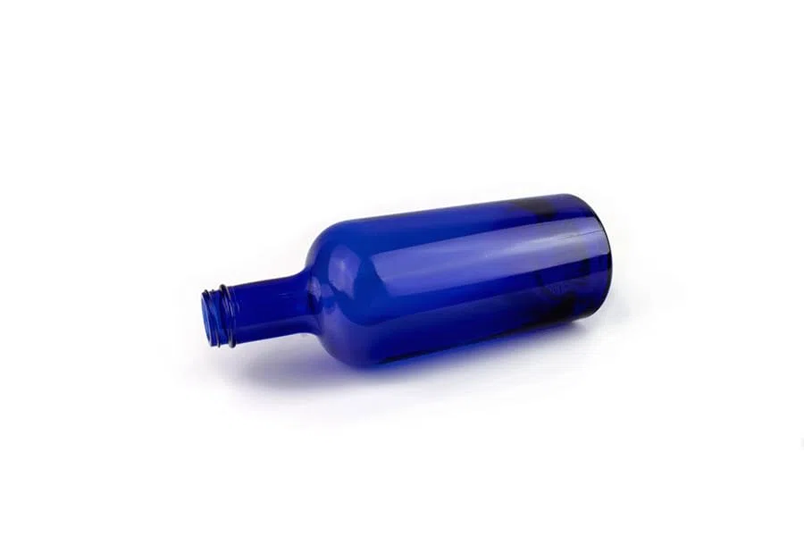 Bottiglia modello GIN in Vetro Blu solarizzata per Acqua 750 ml con tappo